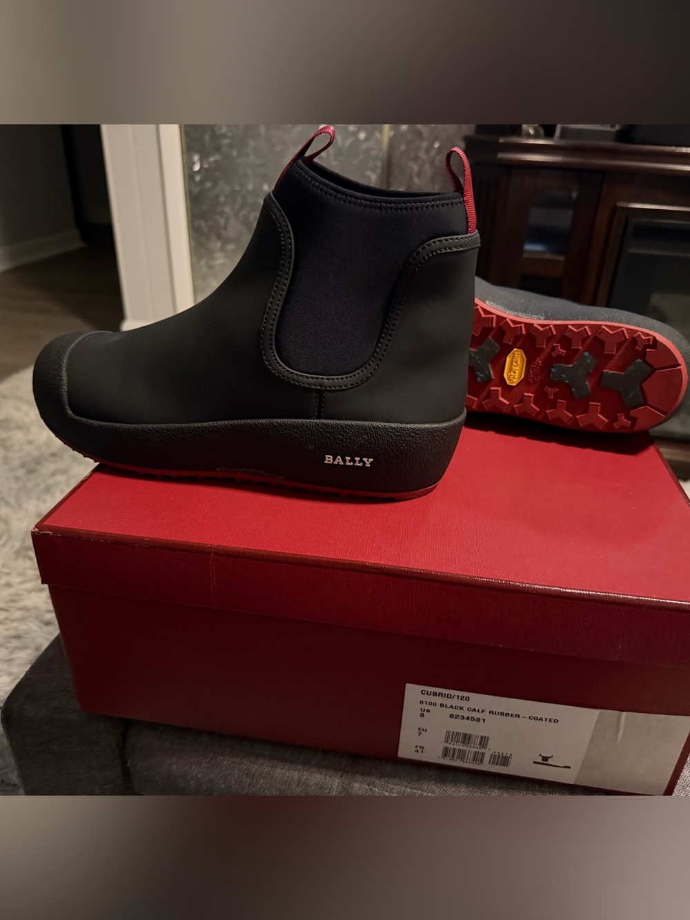Bally Black Rain Chelsea Boots with Red Outsole Accents